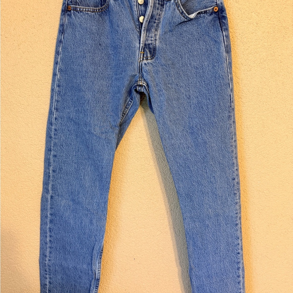 Levi's Light Blue Denim Jeans with Red Logo Tag